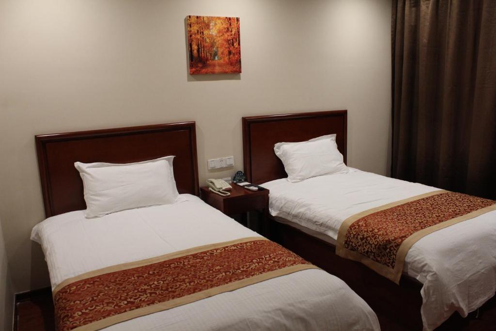 Двухместный (Двухместный номер Делюкс с 2 отдельными кроватями) отеля GreenTree Inn Jiangsu Suzhou Railway Station Business Hotel, Сучжоу
