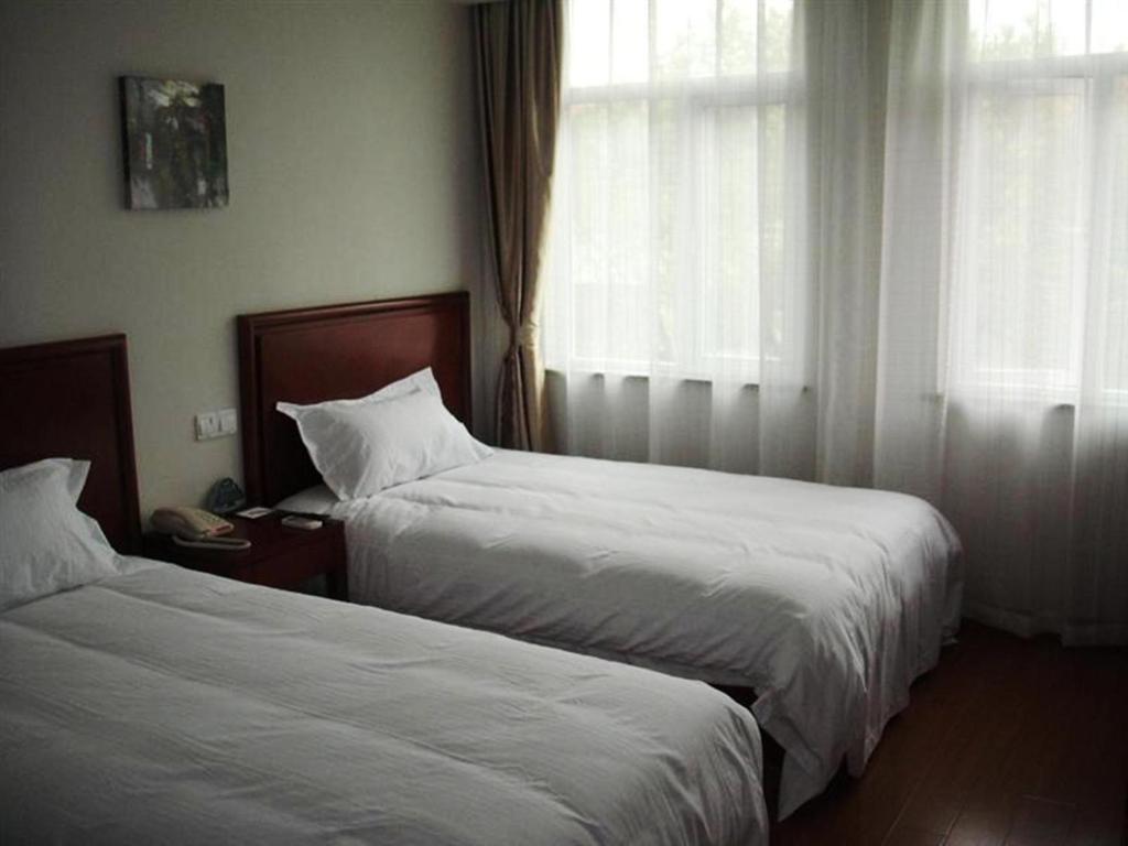 Двухместный (Стандартный двухместный номер с 2 отдельными кроватями) отеля GreenTree Inn Jiangsu Suzhou Wuzhong Business Hotel, Сучжоу