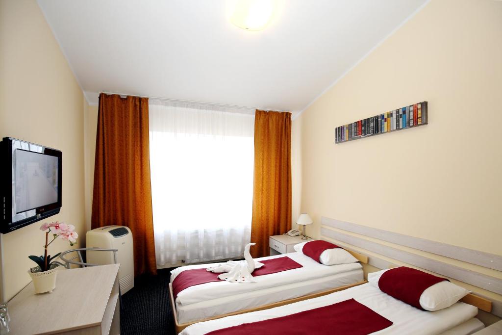 Двухместный (Двухместный номер с 2 отдельными кроватями) отеля Apart Hotel Tomo, Рига