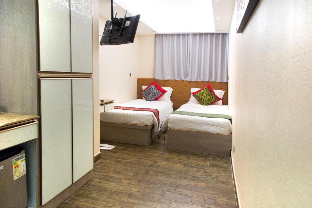 Двухместный (Двухместный номер Делюкс с 2 отдельными кроватями) отеля Metroplace Boutique Hotel, Гонконг (город)