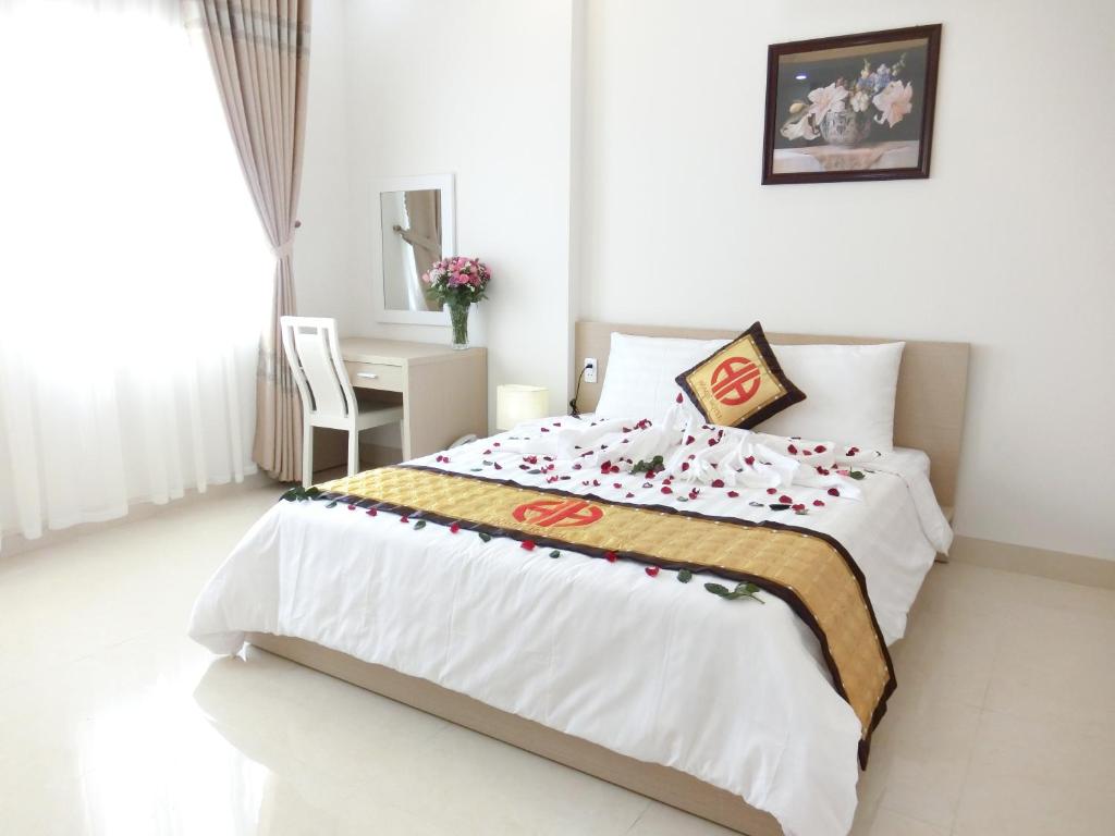Двухместный (Двухместный номер Делюкс с 1 кроватью (для 2 взрослых и 1 ребенка)) отеля Homie Hotel, Дананг