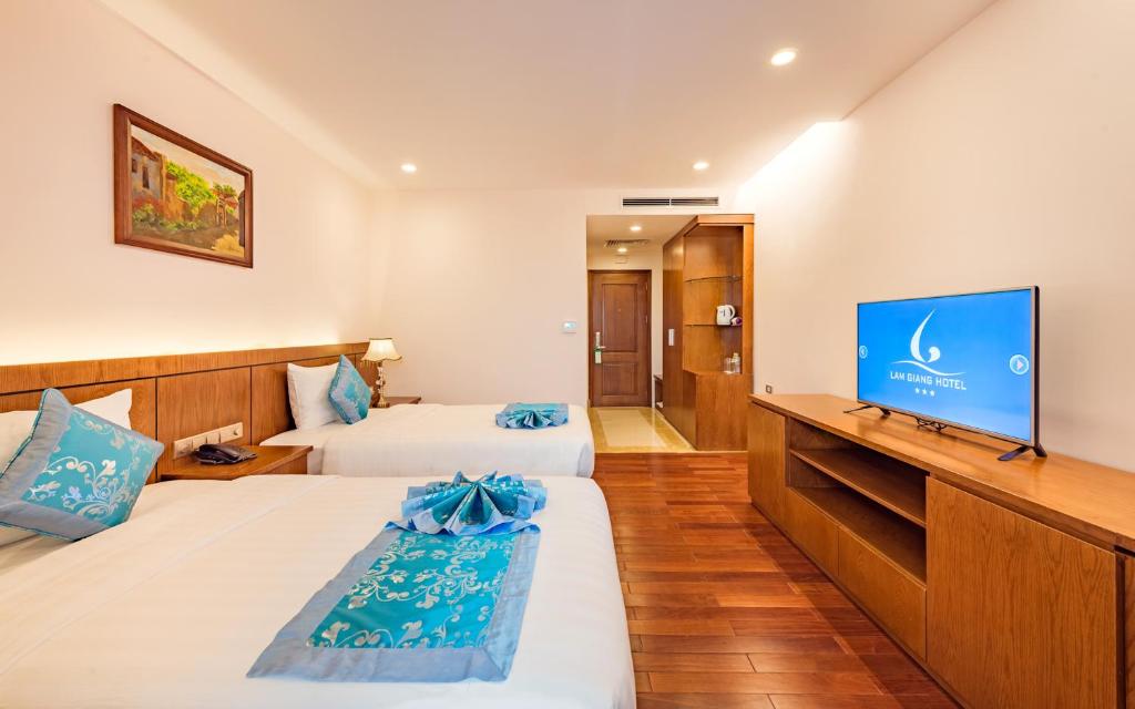 Двухместный (Двухместный номер Делюкс с 2 отдельными кроватями) отеля Lam Giang Hotel, Винь