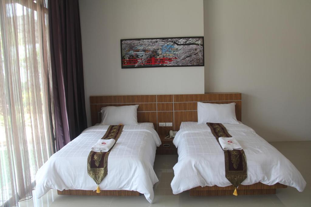 Двухместный (Стандартный двухместный номер с 2 отдельными кроватями) отеля Tawan Anda Garden, Сураттхани