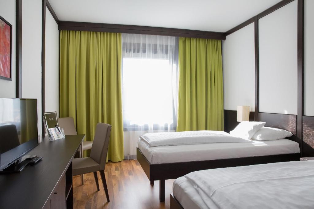 Двухместный (Стандартный двухместный номер с 2 отдельными кроватями) отеля Hotel Central, Инсбрук