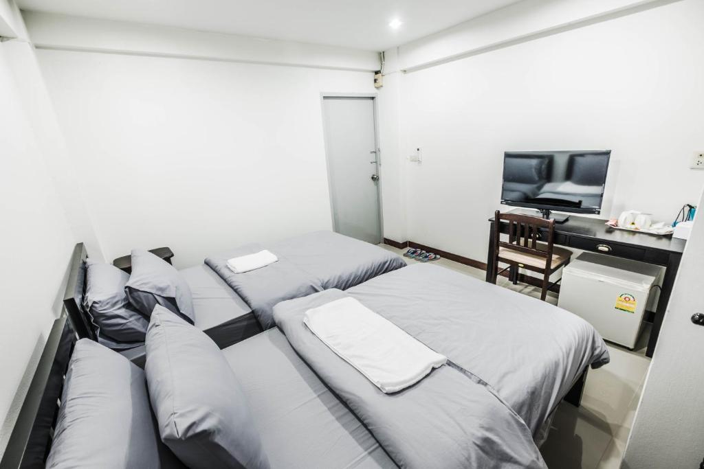 Двухместный (Бюджетный двухместный номер с 2 отдельными кроватями) апарт-отеля Thip Mansion Don Mueang Airport, Бангкок