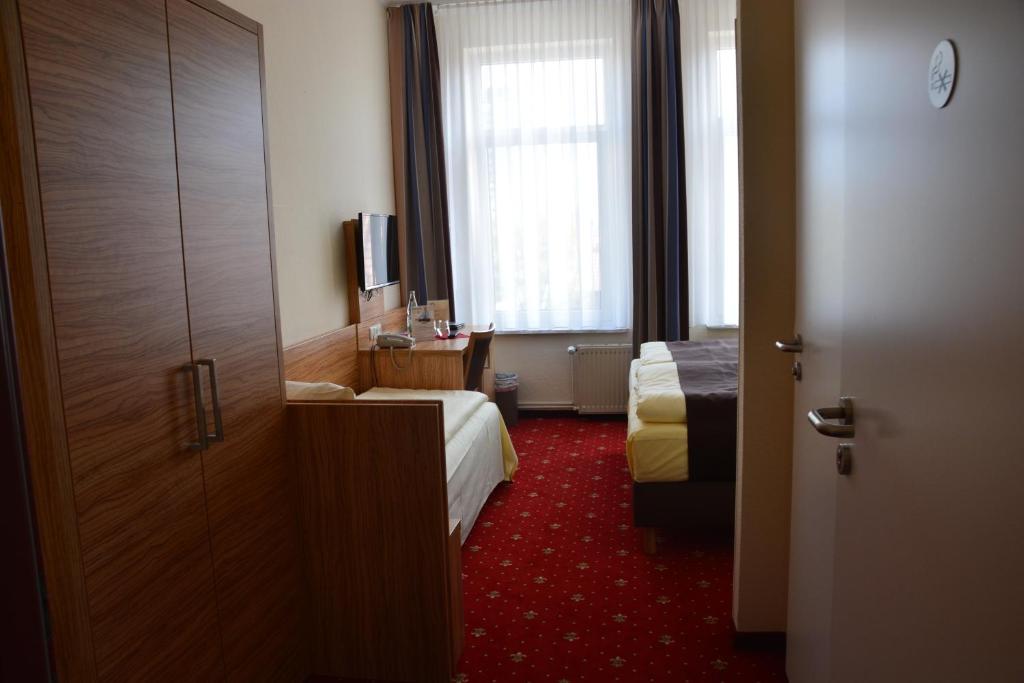 Трехместный (Трехместный номер) отеля Altstadthotel Harburg, Гамбург