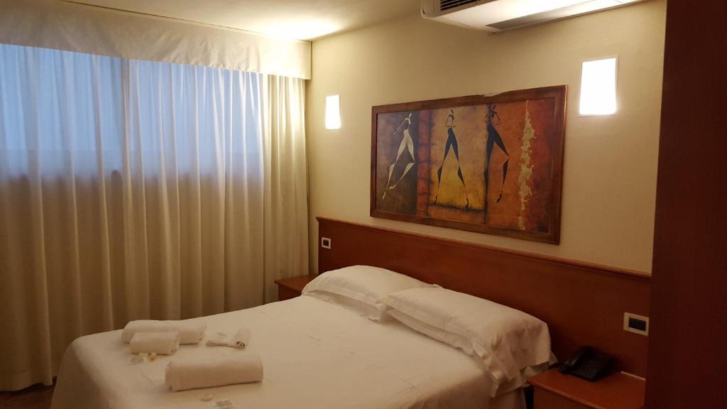 Двухместный (Двухместный номер эконом-класса с 1 кроватью или 2 отдельными кроватями - Цокольный этаж) отеля Hotel Principe di Piemonte, Римини
