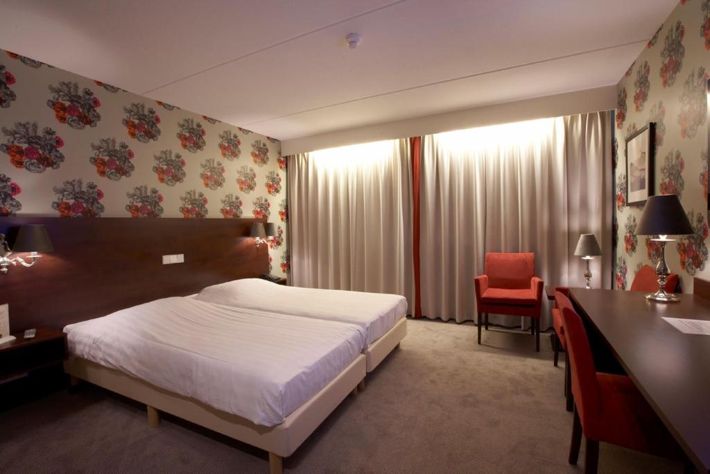Двухместный (Улучшенный номер с 2 одноместными кроватями) отеля Design Hotel Jules, Амстердам