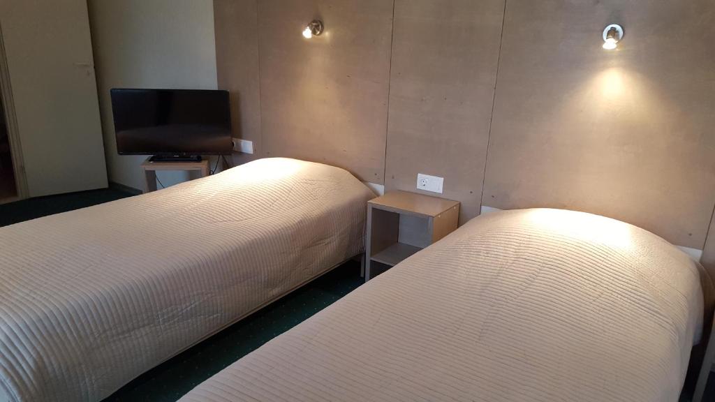 Двухместный (Двухместный номер с 2 отдельными кроватями) отеля Hotel Gulbene, Алуксне