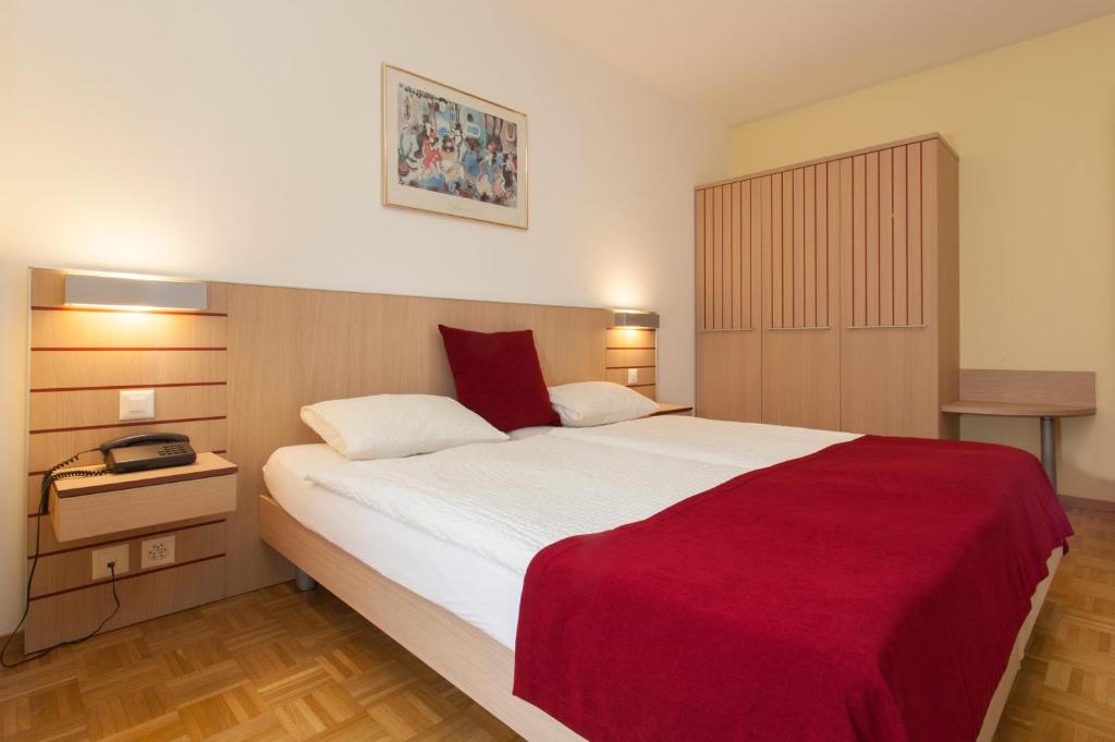 Двухместный (Двухместный номер «Комфорт» с 1 кроватью и балконом) отеля Hotel Geranio Au Lac, Локарно