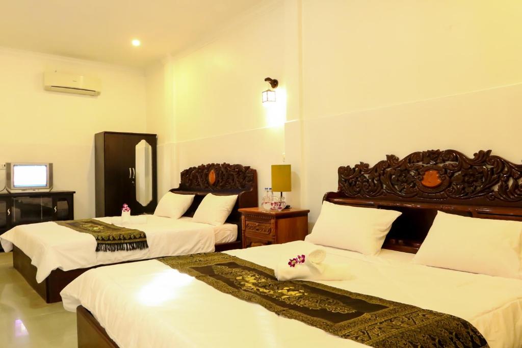 Двухместный (Стандартный двухместный номер с 2 отдельными кроватями) отеля RS Guesthouse, Пномпень