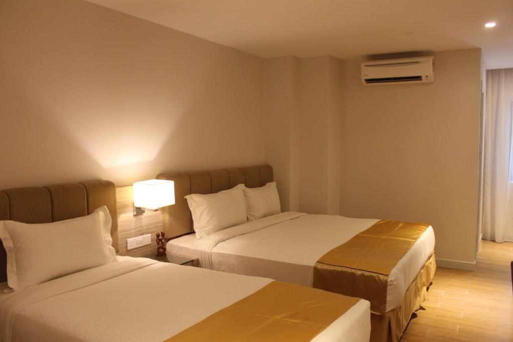 Трехместный (Трехместный номер Делюкс) отеля NU Hotel @ KL Sentral, Куала-Лумпур
