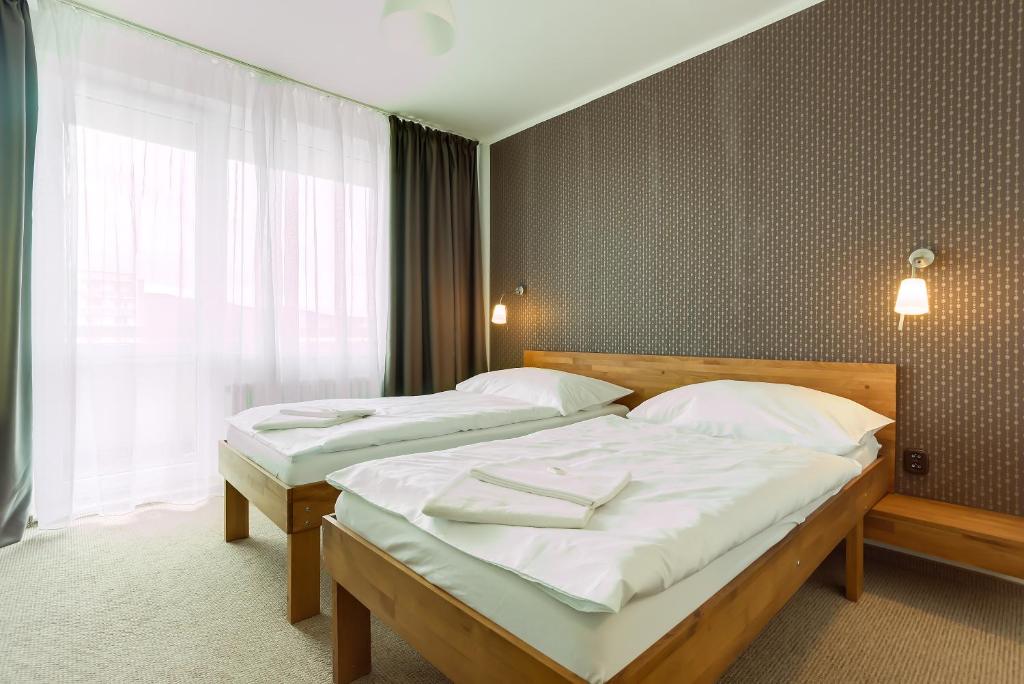 Двухместный (Стандартный двухместный номер с 2 отдельными кроватями) отеля Hotel Lineas, Прешов