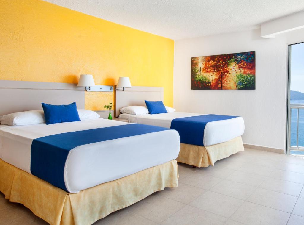 Двухместный (Standard Room Sea Partial View) курортного отеля Calinda Beach Acapulco, Акапулько-де-Хуарес