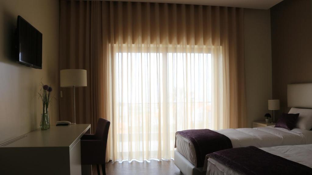 Двухместный (Двухместный номер с новогодним пакетом услуг) отеля Monte Lírio Hotel & Wellness Centre, Эшпинью