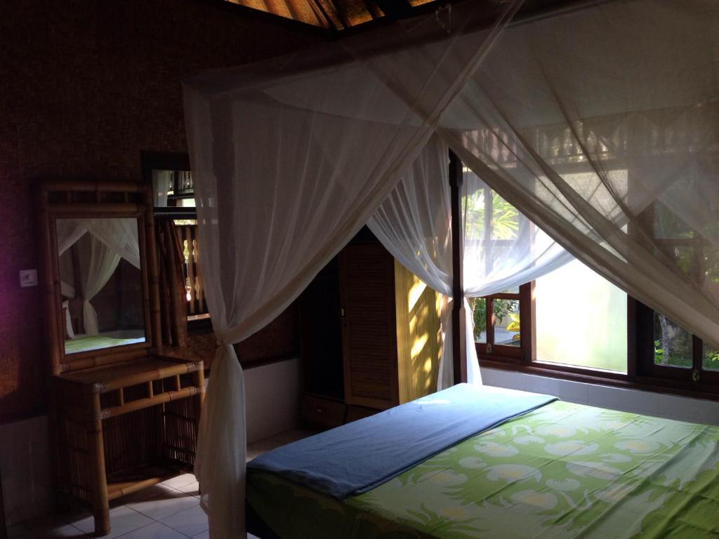 Двухместный (Бюджетный двухместный номер с 1 кроватью) парк-отеля Pondok Bambu Homestay, Убуд