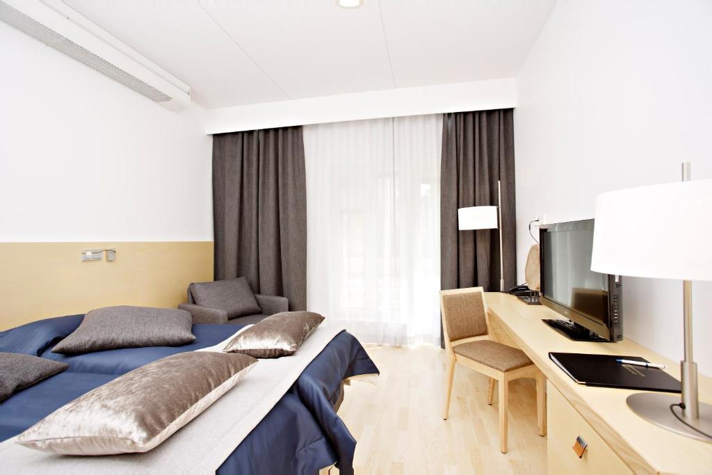 Двухместный (Улучшенный двухместный номер с 2 отдельными кроватями) отеля Kyyhkylä Hotel and Manor, Миккели