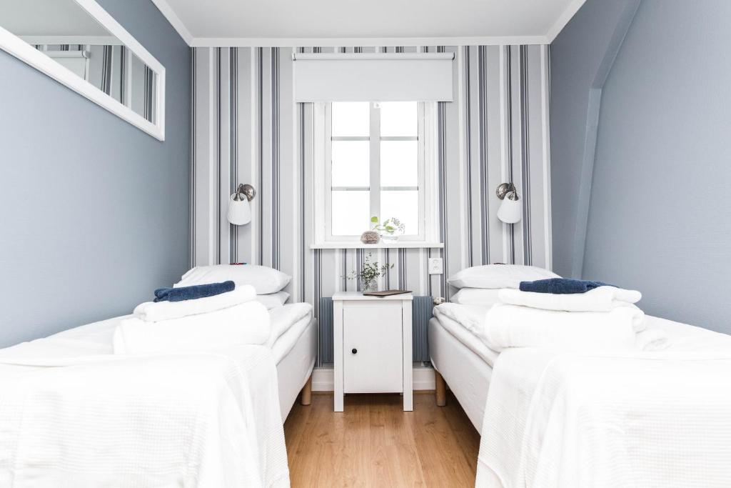 Двухместный (Двухместный номер с 2 отдельными кроватями и общей ванной комнатой) гостевого дома Sea Lodge Smögen, Смёген