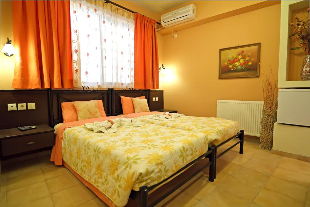 Двухместный (Бюджетный двухместный номер с 2 отдельными кроватями) гостевого дома Minos Pension, Родос