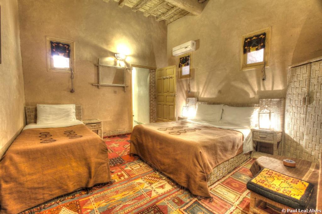 Трехместный (Трехместный номер с собственной ванной комнатой) отеля Kasbah Baha Baha, Нкоб