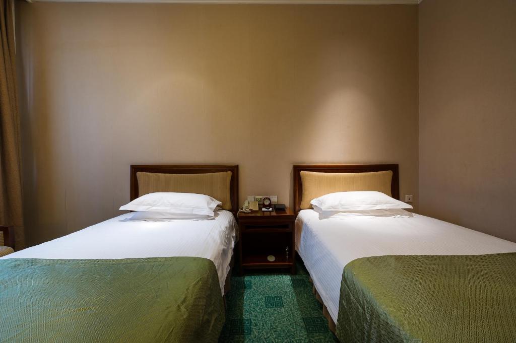 Двухместный (Представительский двухместный номер с 2 отдельными кроватями) отеля Jade Garden Hotel, Пекин