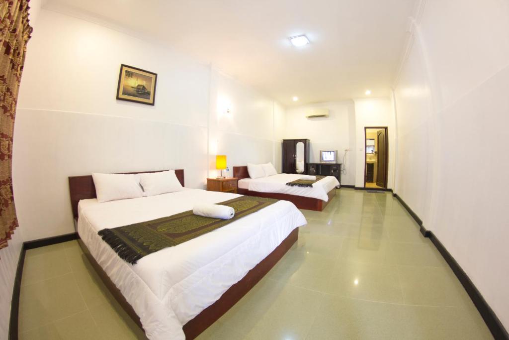 Двухместный (Улучшенный двухместный номер с 1 кроватью и балконом) отеля RS Guesthouse, Пномпень