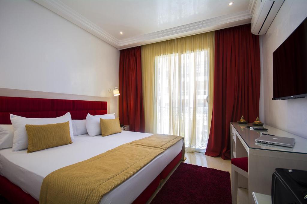 Двухместный (Стандартный двухместный номер с 1 кроватью или 2 отдельными кроватями) отеля Hôtel Racine, Марракеш