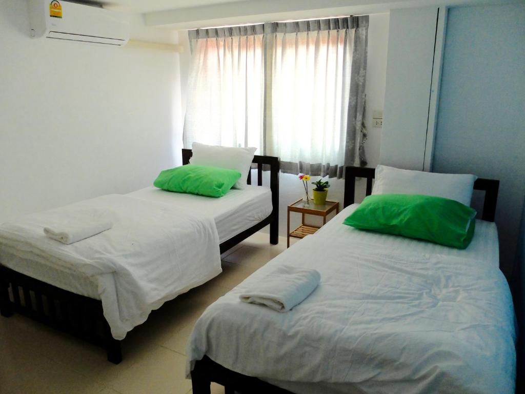 Двухместный (Двухместный номер с 2 отдельными кроватями) гостевого дома We Inn, Бангкок