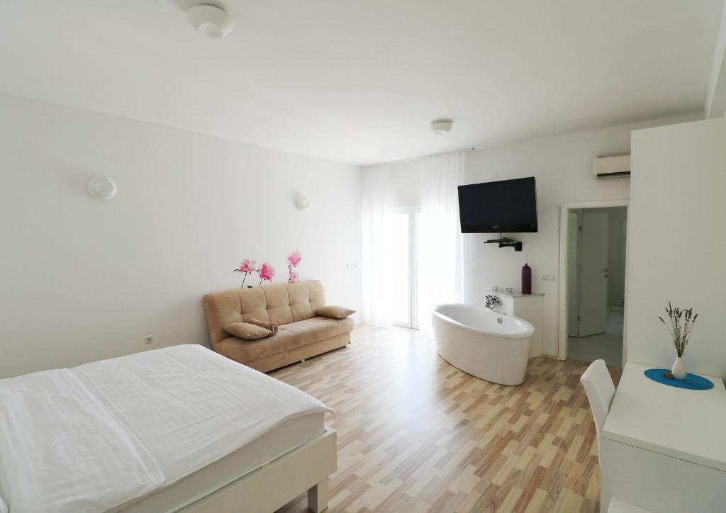 Двухместный (Двухместный номер Делюкс с 1 кроватью) гостевого дома Apartments Barbati, Новалья