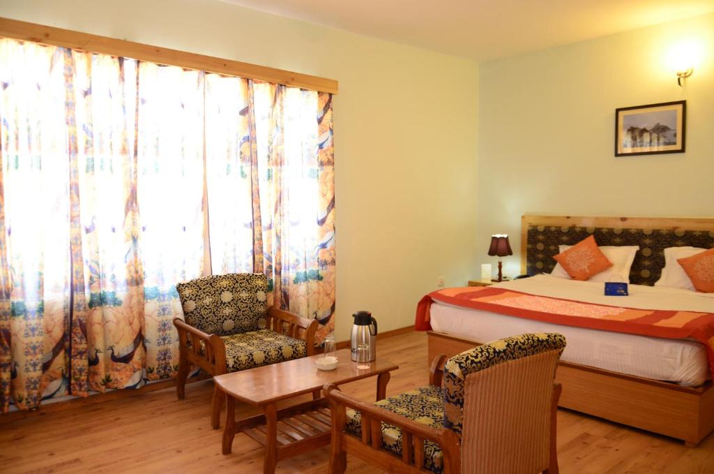 Двухместный (Двухместный номер Делюкс с 1 кроватью или 2 отдельными кроватями) отеля Hotel Lingzi, Лех