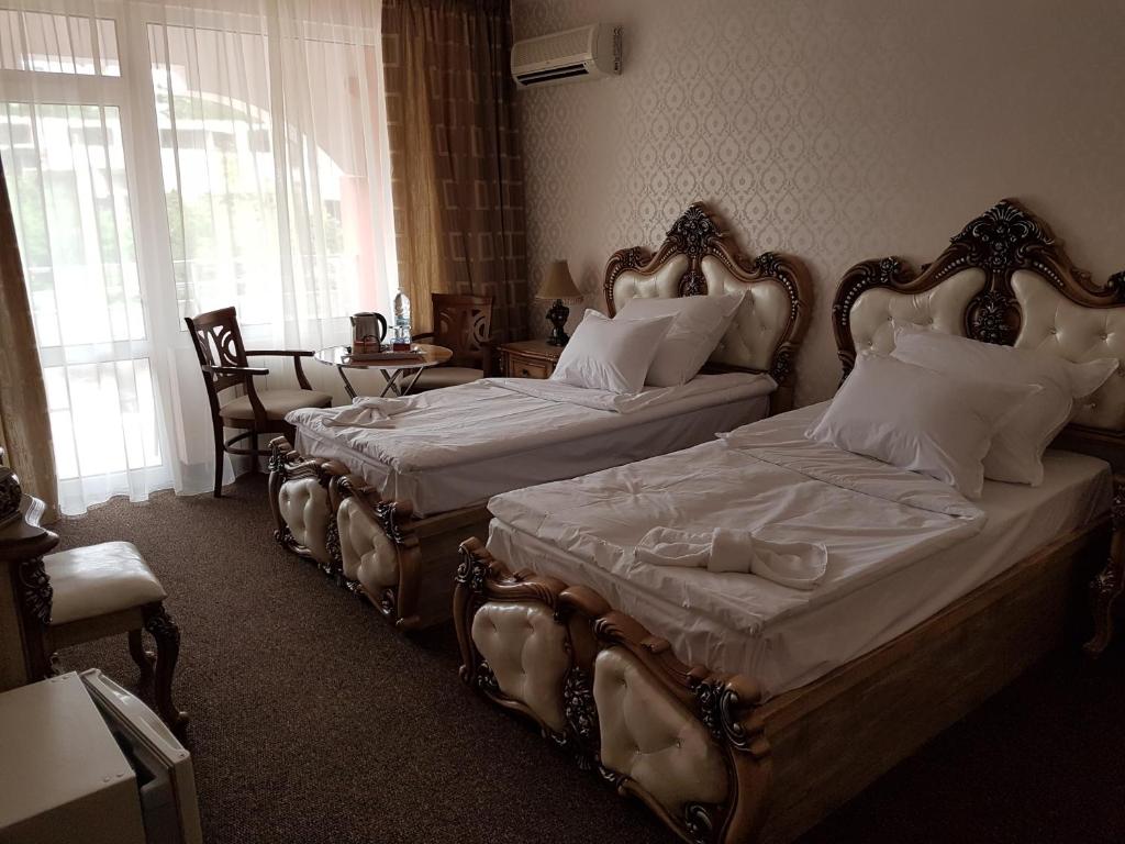 Двухместный (Двухместный номер Делюкс с 2 отдельными кроватями (для 2 взрослых и 1 ребенка)) отеля Hotel Elit Palace and SPA, Балчик