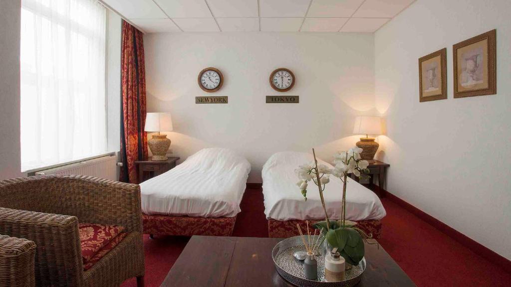 Двухместный (Двухместный номер эконом-класса с 2 отдельными кроватями) отеля Hotel De Beurs, Амстердам