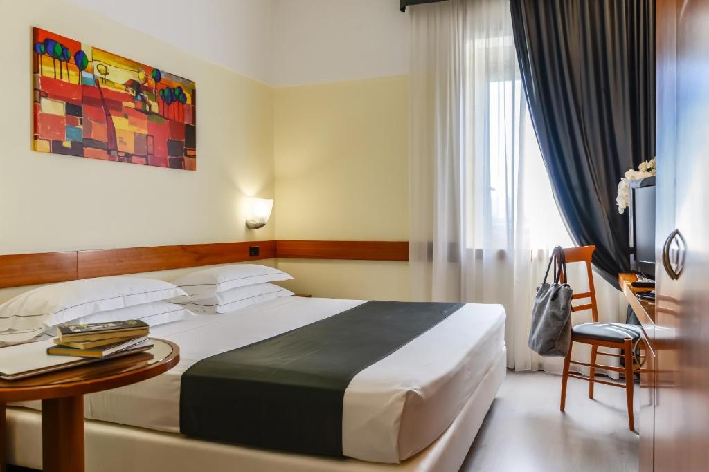Двухместный (Стандартный двухместный номер с 1 кроватью или 2 отдельными кроватями, парковка на 15 дней и трансфер от/до аэропорта) отеля Hotel Bologna Airport, Болонья