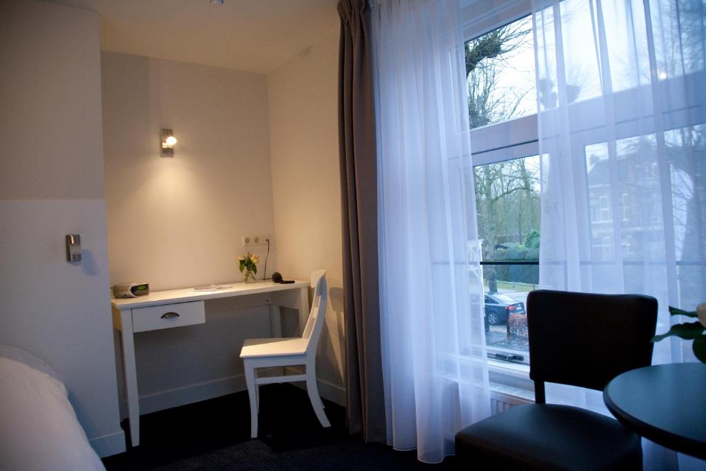 Двухместный (Двухместный номер с 2 отдельными кроватями и окном) отеля Hotel-Restaurant Het Rechthuis, Амстердам