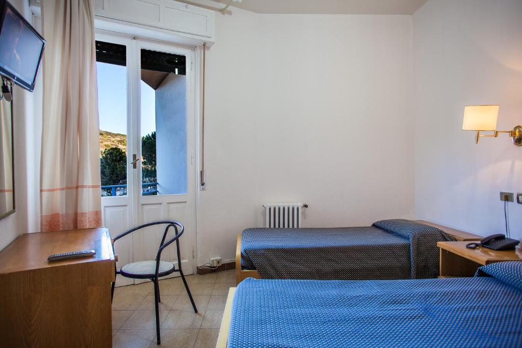 Двухместный (Двухместный номер с 1 кроватью или 2 отдельными кроватями) отеля Hotel Ristorante Calamosca, Кальяри