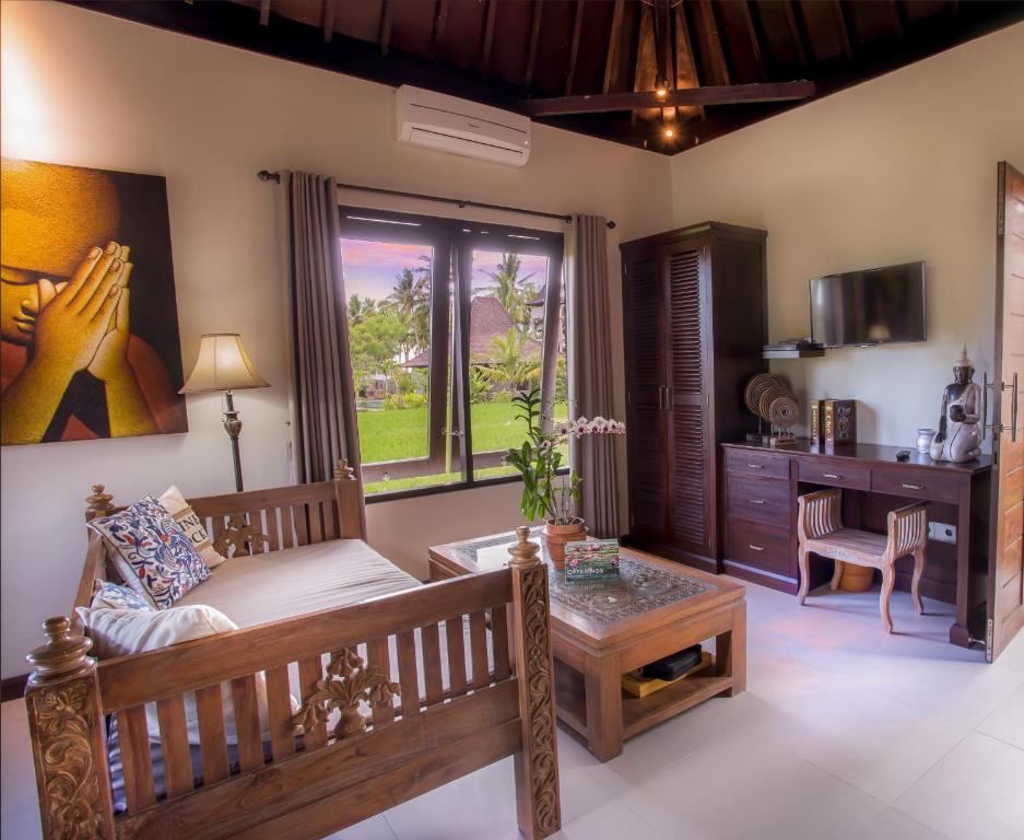 Сьюит (Суперлюкс с кроватью размера «king-size» и видом на рисовые поля) отеля Solo Villas & Retreat, Убуд