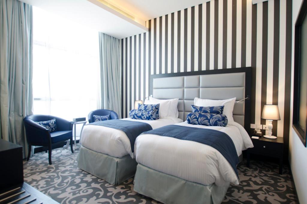 Двухместный (Классический двухместный номер с 2 отдельными кроватями) отеля Somewhere Hotel Tecom, Дубай