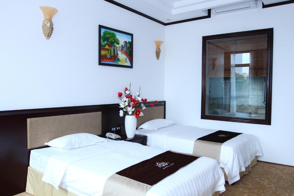 Двухместный (Представительский двухместный номер с 2 отдельными кроватями) отеля A1 Hill Hanoi Hotel, Ханой