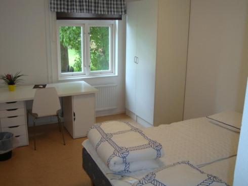 Двухместный (Двухместный номер с 2 отдельными кроватями и общим туалетом) хостела Kalmar Sjömanshem, Кальмар