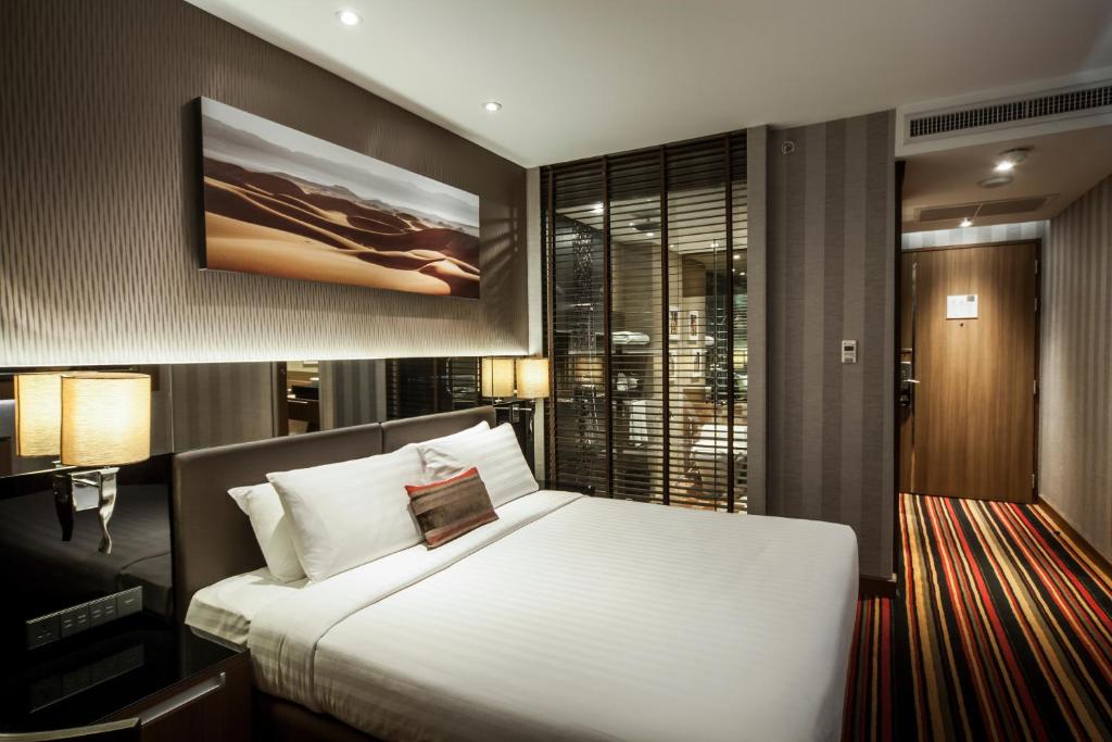 Двухместный (Двухместный номер Делюкс с 1 кроватью или 2 отдельными кроватями) отеля The Continent Bangkok by Compass Hospitality, Бангкок