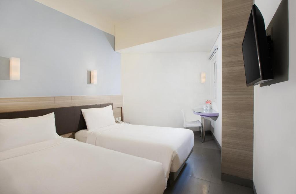 Двухместный (Двухместный номер «Смарт» с 2 отдельными кроватями) отеля Amaris Hotel Satrio Kuningan - Jakarta, Джакарта