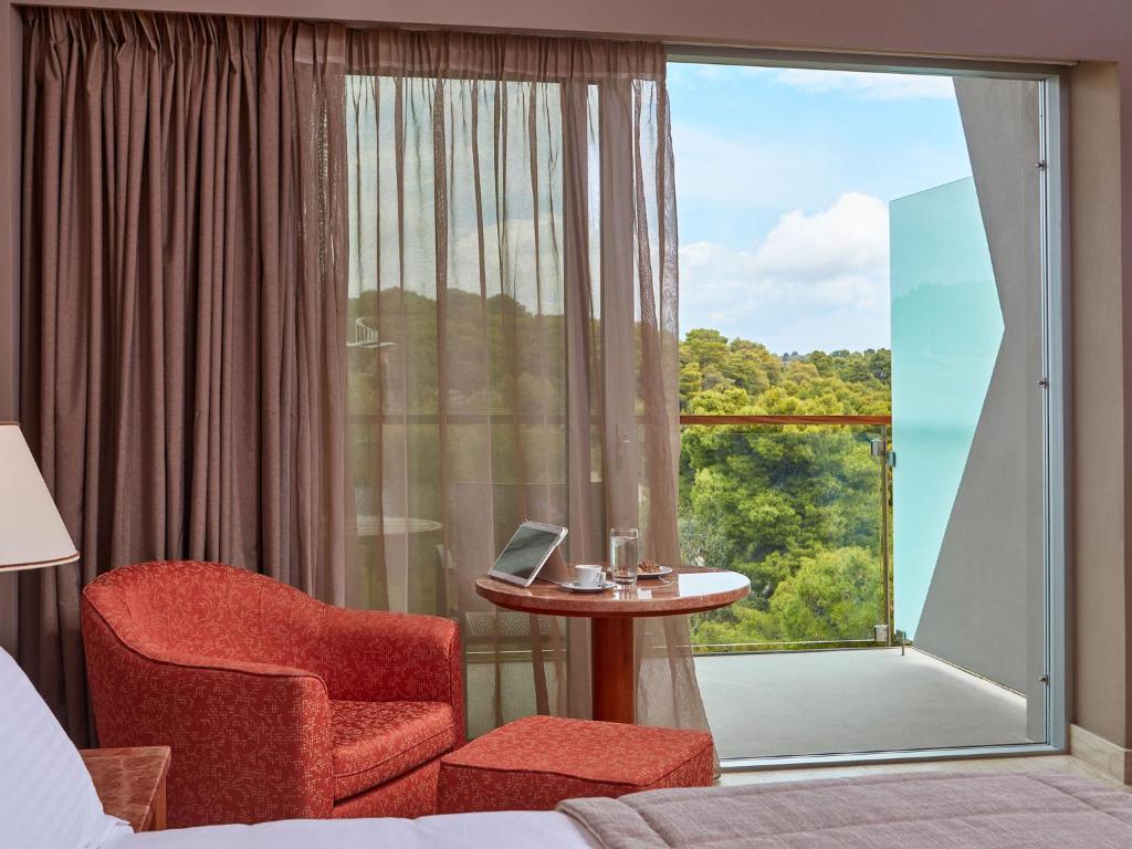 Двухместный (Двухместный номер с 1 кроватью или 2 отдельными кроватями, вид на горы) курортного отеля AKS Hinitsa Bay, Порто-Хели