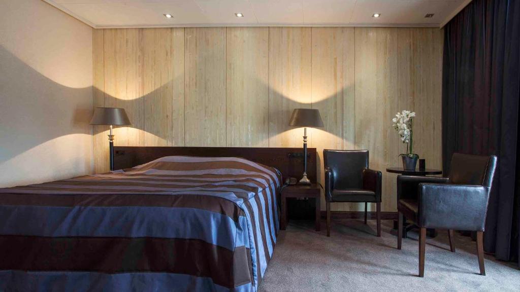 Двухместный (Роскошный номер с кроватью размера «king-size») отеля Hotel De Beurs, Амстердам