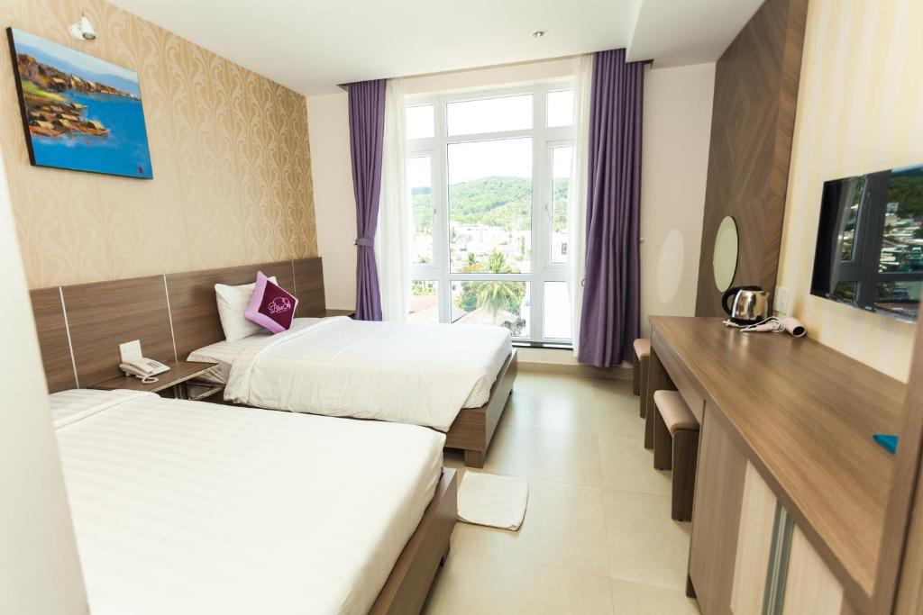 Двухместный (Двухместный номер Делюкс с 2 отдельными кроватями) отеля Blue Sky Phu Quoc Hotel, Дуонг-Донг