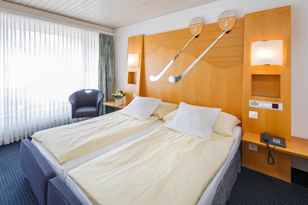 Двухместный (Стандартный двухместный номер с 2 отдельными кроватями) отеля Stella Swiss Quality Hotel, Интерлакен
