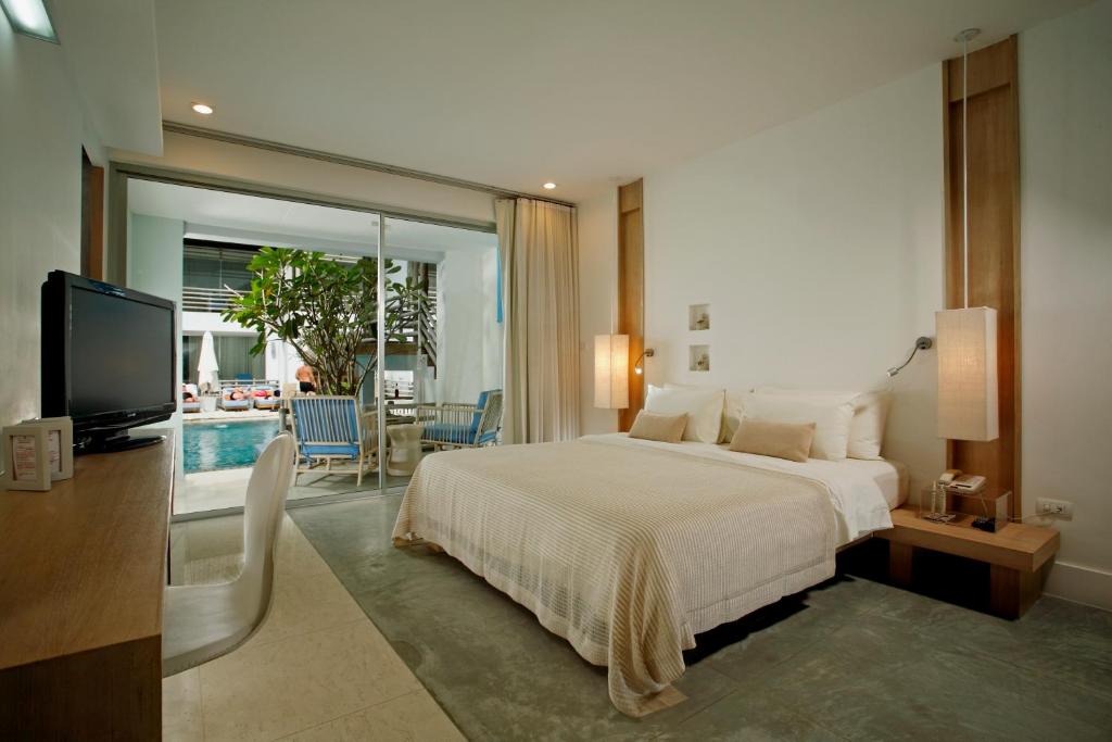 Двухместный (Двухместный номер Делюкс с 1 кроватью или 2 отдельными кроватями, доступ к бассейну) курортного отеля Ramada Phuket Southsea, Пхукет
