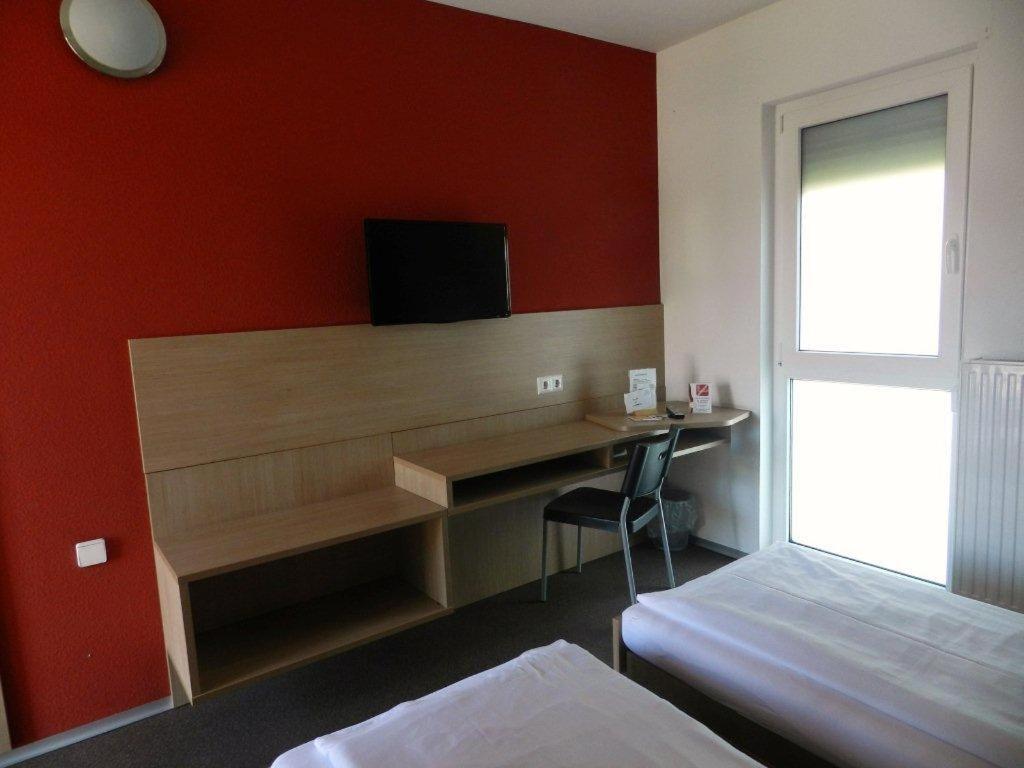 Двухместный (Двухместный номер с 1 кроватью или 2 отдельными кроватями) мотеля Motel Angern, Ангерн-ан-дер-Марх