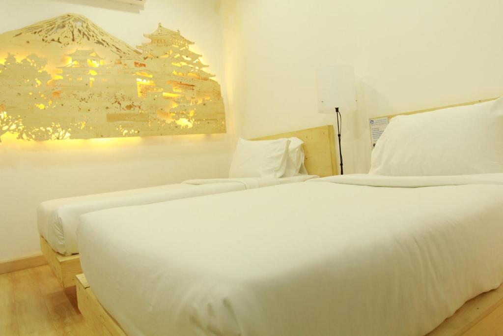 Двухместный (Улучшенный двухместный номер с 2 отдельными кроватями) отеля My Room By Sermsub, Сакэу