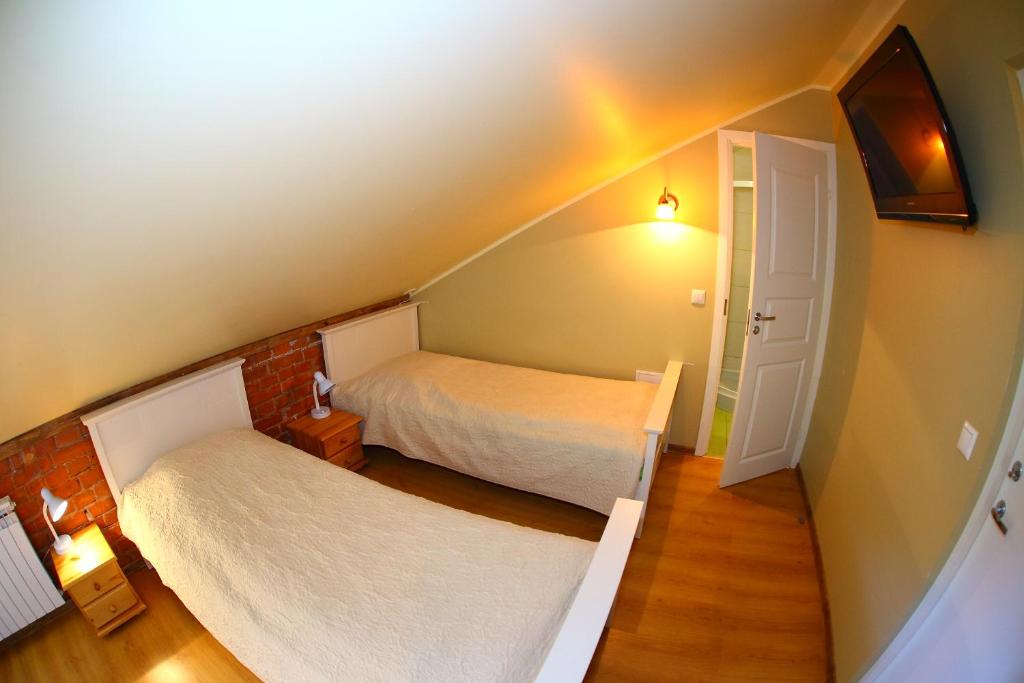 Двухместный (Двухместный номер с 2 отдельными кроватями) отеля Guesthouse Mõisa Ait, Выру