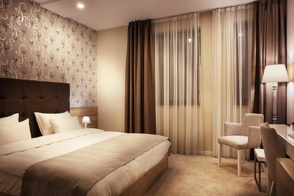 Двухместный (Номер Делюкс с кроватью размера «queen-size») отеля IG Hotel Garni, Горни Милановац